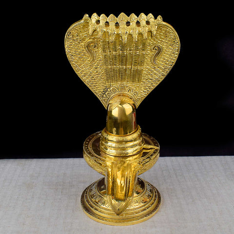 14.2-inch Brass Shivling with Nag Hood, intricately designed for divine worship and ideal for Shivratri rituals and spiritual décor. No.1 Brass Idol Store www.satvikstore.in 