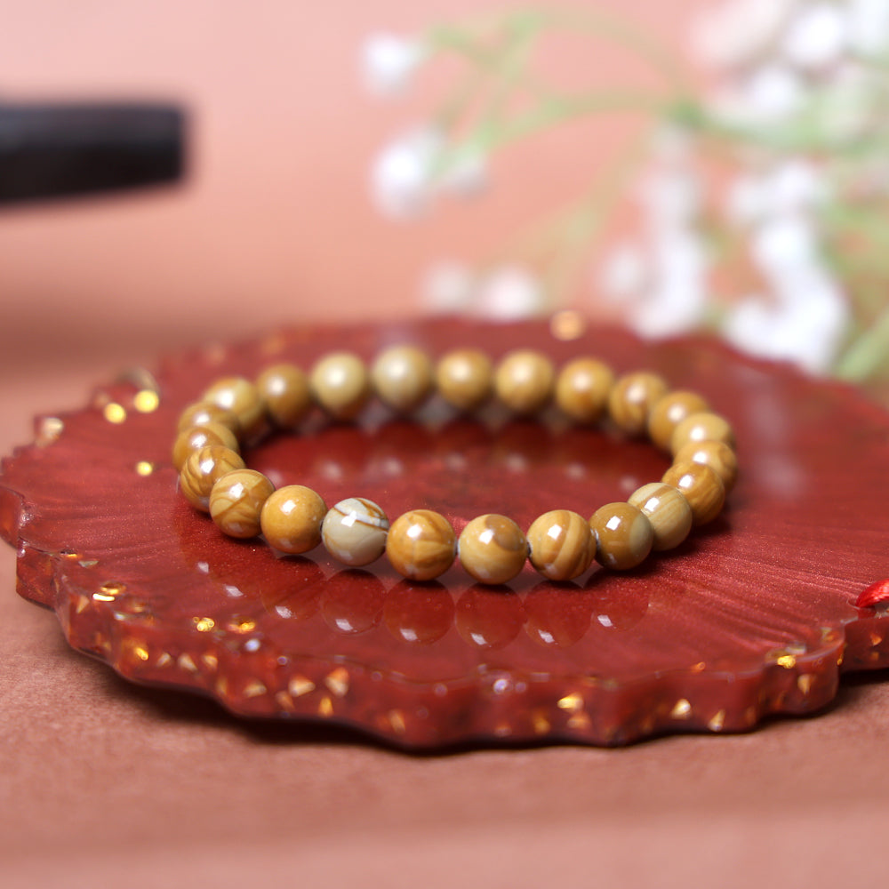 8mm Camel Jasper bracelet for strength, grounding, and emotional calmness. India’s Largest Pooja Accessories Brand – www.satvikstore.in
