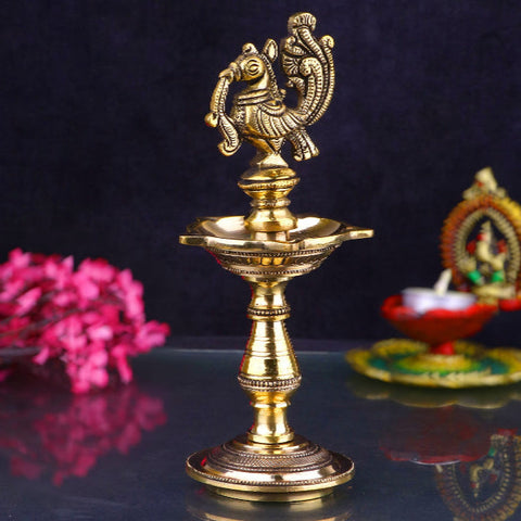 A beautifully crafted Brass Panchmukhi Diya (Oil Lamp), featuring five intricate faces symbolizing the five elements. This traditional diya is perfect for religious ceremonies, spiritual rituals, or as an elegant decorative piece, bringing peace and light to any space. India’s Largest Pooja Accessories Brand – www.satvikstore.in