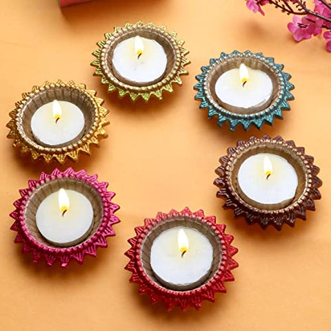 Exquisite Decorative Multicolor Surya Metal Diya – A beautifully crafted metal diya with intricate multicolor designs representing the Sun (Surya). India’s Largest Pooja Accessories Brand – www.satvikstore.in